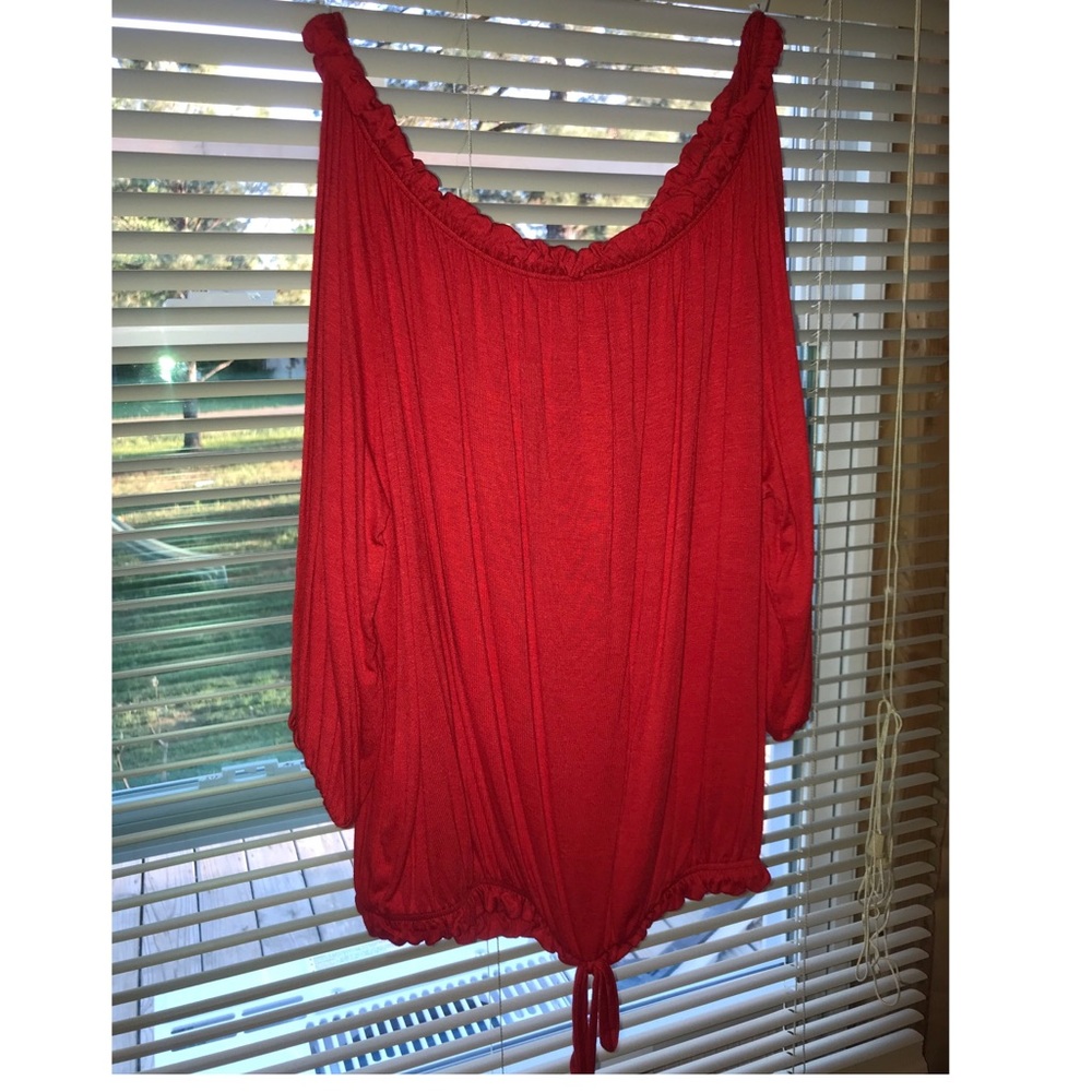 Red off the shoulder shirt